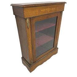 Victorian walnut pier cabinet, moulded rectangular top over inlaid frieze, enclosed by single glazed door, the uprights inlaid with extending stylised foliage decoration and cast gilt metal mounts, on moulded plinth base