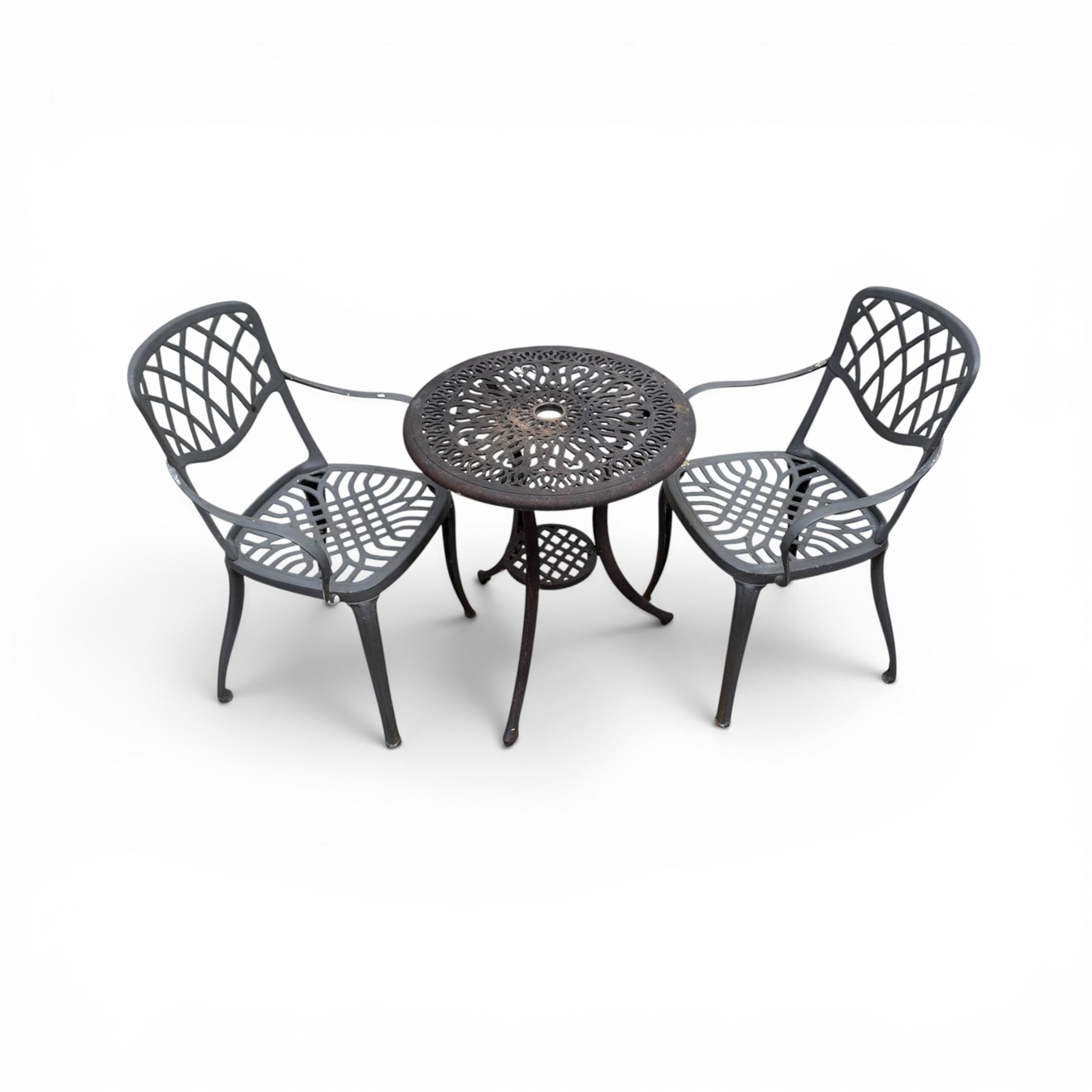 Circular cast aluminium garden table and pair of armchairs chairs with lattice backs in a dark grey finish