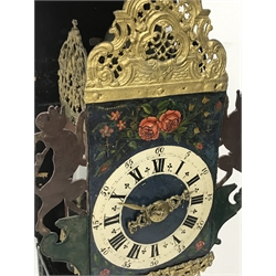 Early 19th century Dutch lantern clock with wall bracket, pierced and cast gilt metal decorative mounts, the dial with Roman and Arabic numerals painted with flowers, painted wall mount with urn and lion pediment, the five pillar movement with verge escapement striking on bell, H76cm