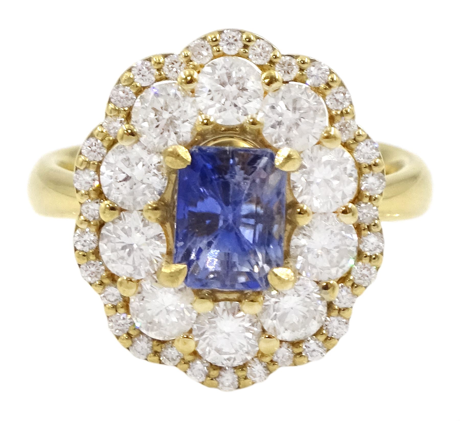 18ct gold radiant cut Ceylon sapphire and round brilliant cut diamond cluster ring, hallmarked, sapphire approx 1.20 carat, total diamond weight approx 1.40 carat