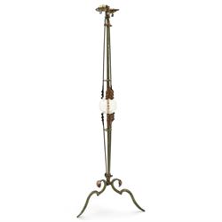 Arts and Crafts wrought iron and copper standard lamp, the openwork stem centred by a cut-...