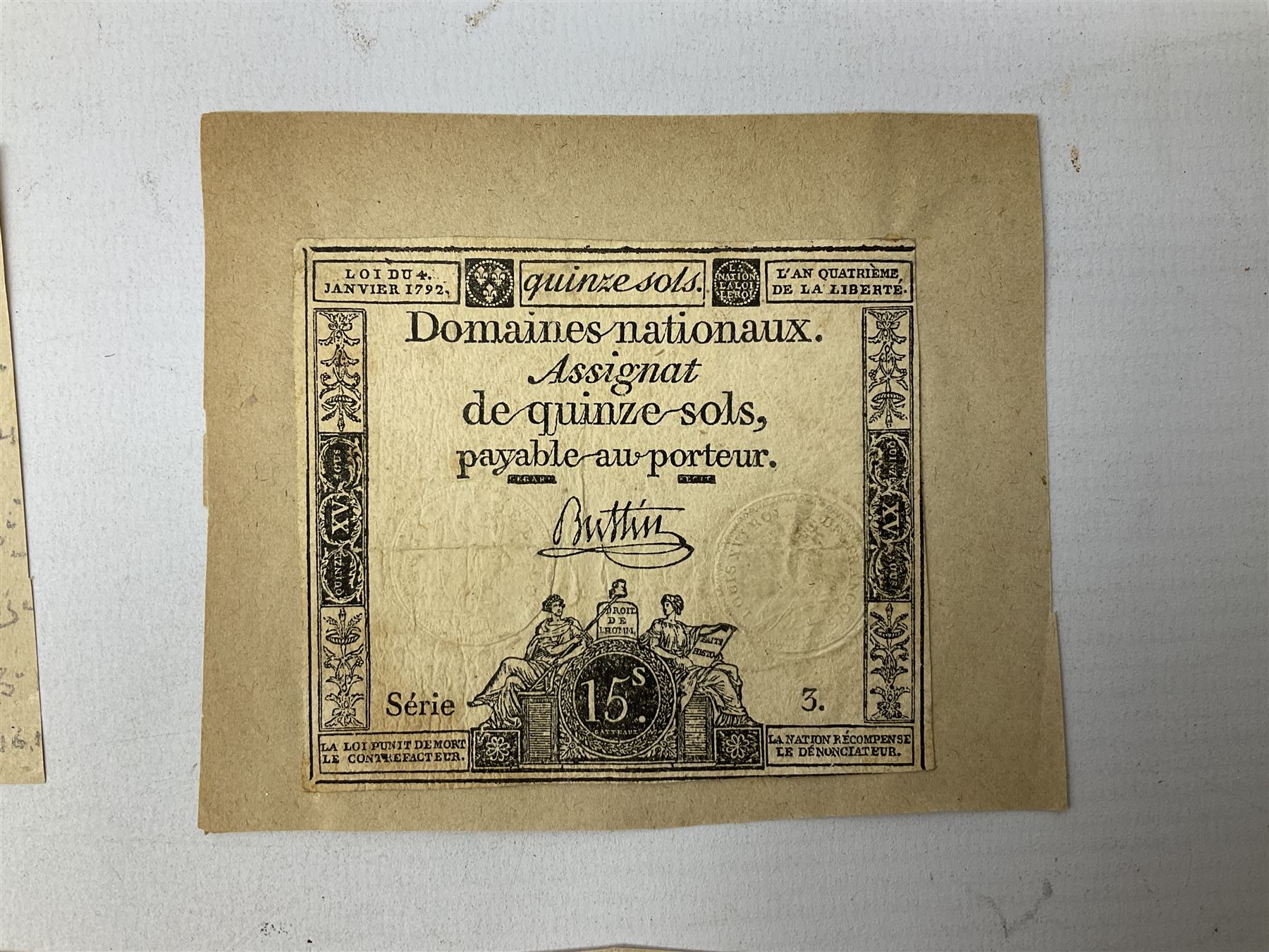 Five French Revolutionary period assignat notes (notes of this type were issued between 1789 and 1796), each mounted on paper