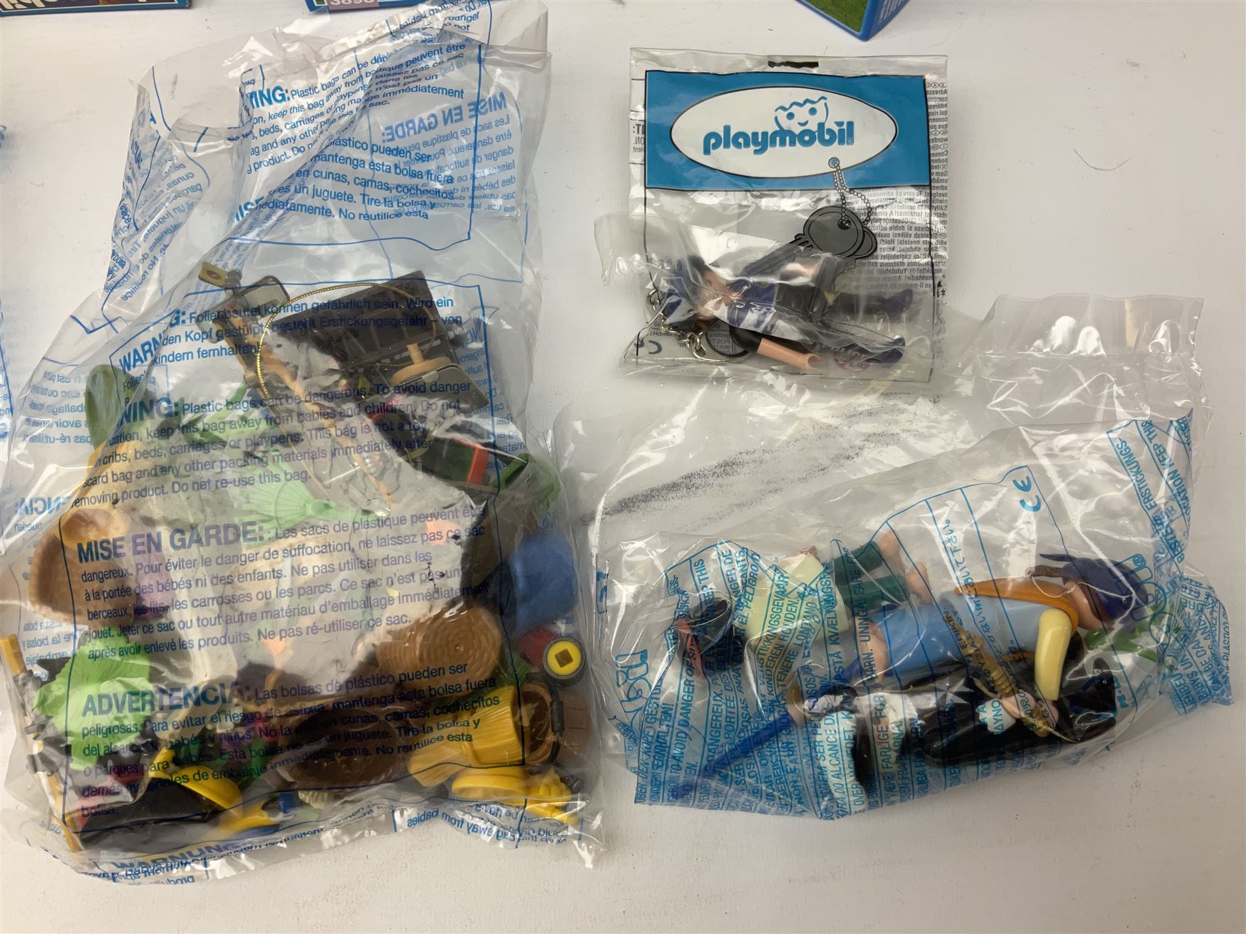 Playmobil - thirteen boxed figures including two Sports Action in unopened boxes; and a large quantity of unboxed figures and accessories