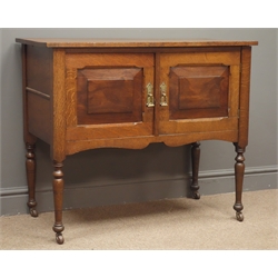  Early 20th century oak washstand two panelled doors, stile turned supports, W91cm, H76cm, D43cm  