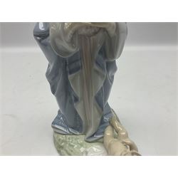 Lladro figure, Holy Night, modelled as Mary kneeling over baby Jesus, sculpted by Vincente Martinez, with original box, no 5796, year issued 1991, year retired 1994, H22cm