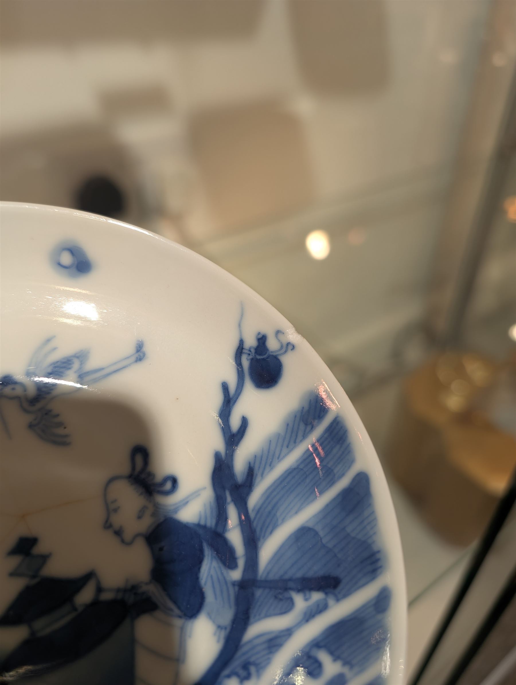 Pair of Chinese blue and white tea bowls, one with cover and four saucers, depicting two figures on a boat at sea, tea bowl H7cm