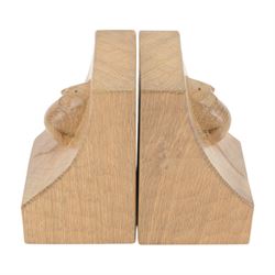 Mouseman - pair of tooled oak bookends, curved form and carved mouse signature, by the workshop of Robert Thompson, H15cm