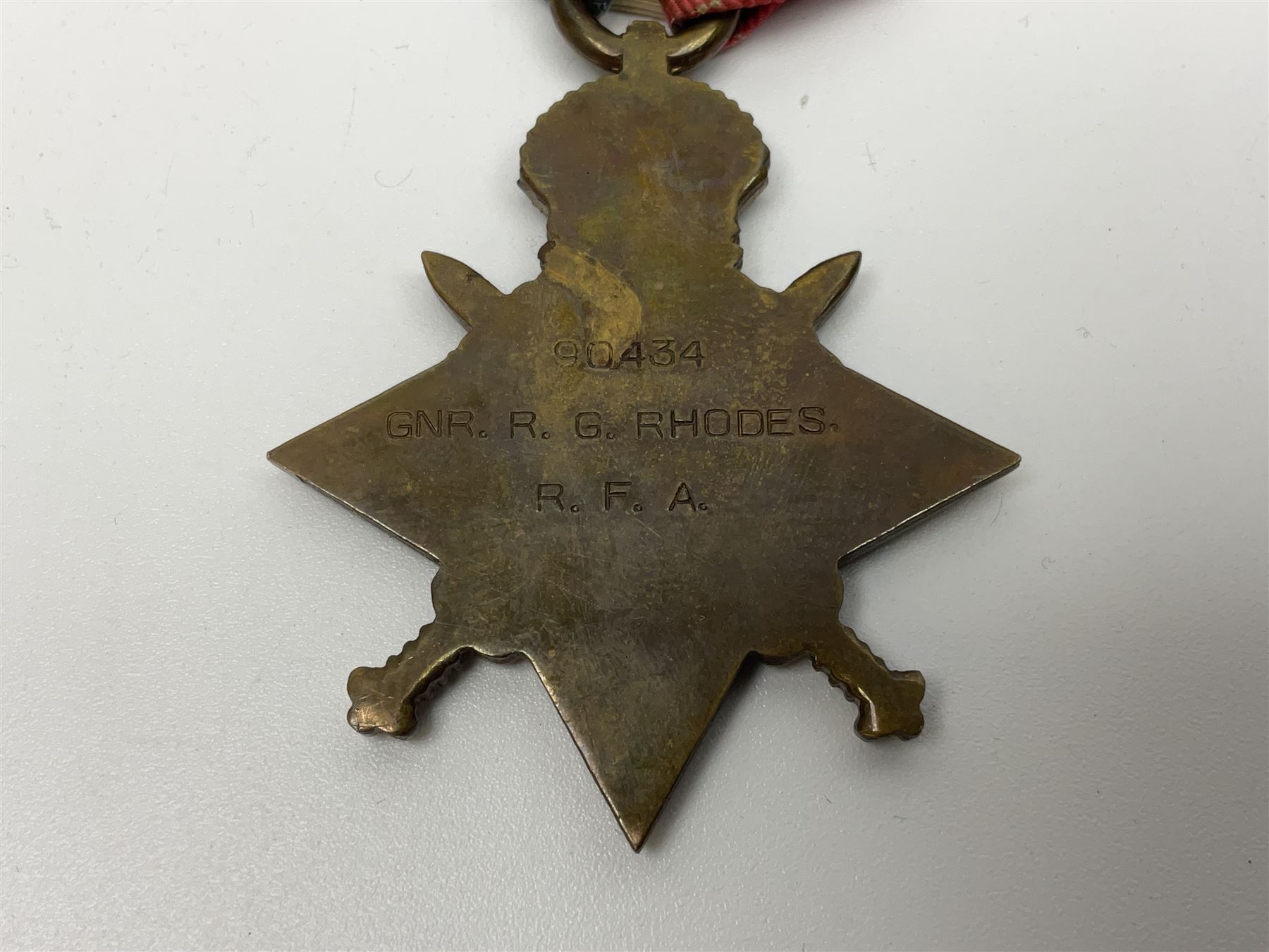 WW1 group of three medals comprising British War Medal, Victory Medal and 1914-15 Star awarded to 90434 Gnr. R.G. Rhodes R.F.A./R.A.; all with ribbons
