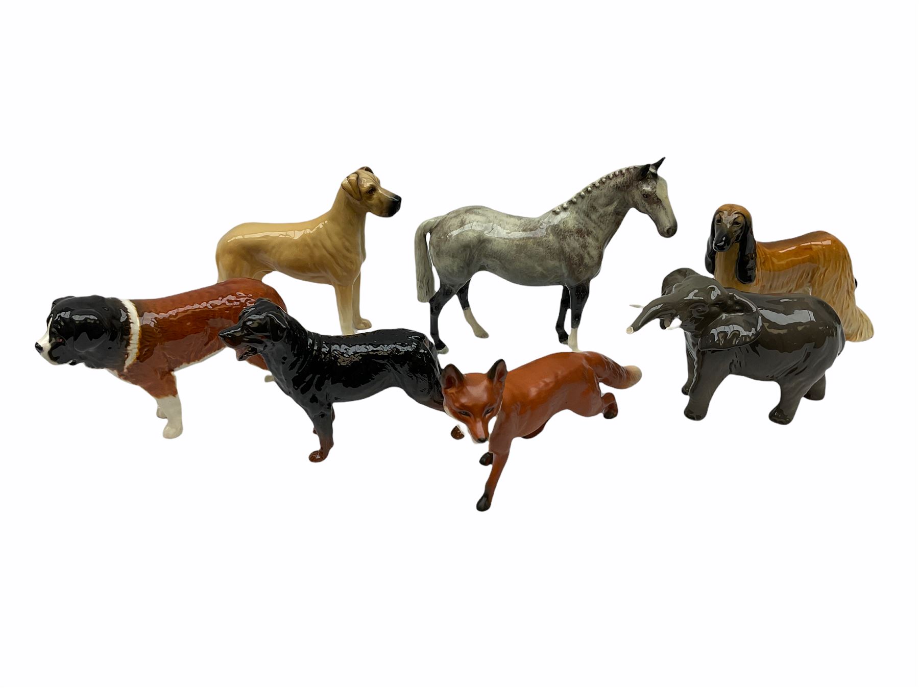 Beswick figures, comprising Afghan Hound 2285, St Bernard 'Corna Garth Stroller' 2221, Rottweiler 3056, Greatdane 'CH Ruler of Ouborough', Fox, Elephant, and dappled grey type horse. 