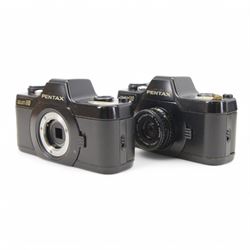 Pentax Auto 110 camera outfit, comprising two camera bodies, serial nos. 2055664 & 1062072, Pentax-110 1:2.8 18mm lens serial no. 1363262, Pentax-110 1:2.8 50mm lens serial no. 1345010, Pentax-110 Zoom 1:2.8 20-40mm lens serial no. 1007131, winder serial no. 450034 and flash no. AF130P, collection of filters and a pair of Perl 8x20 field binoculars, all housed within a flight case