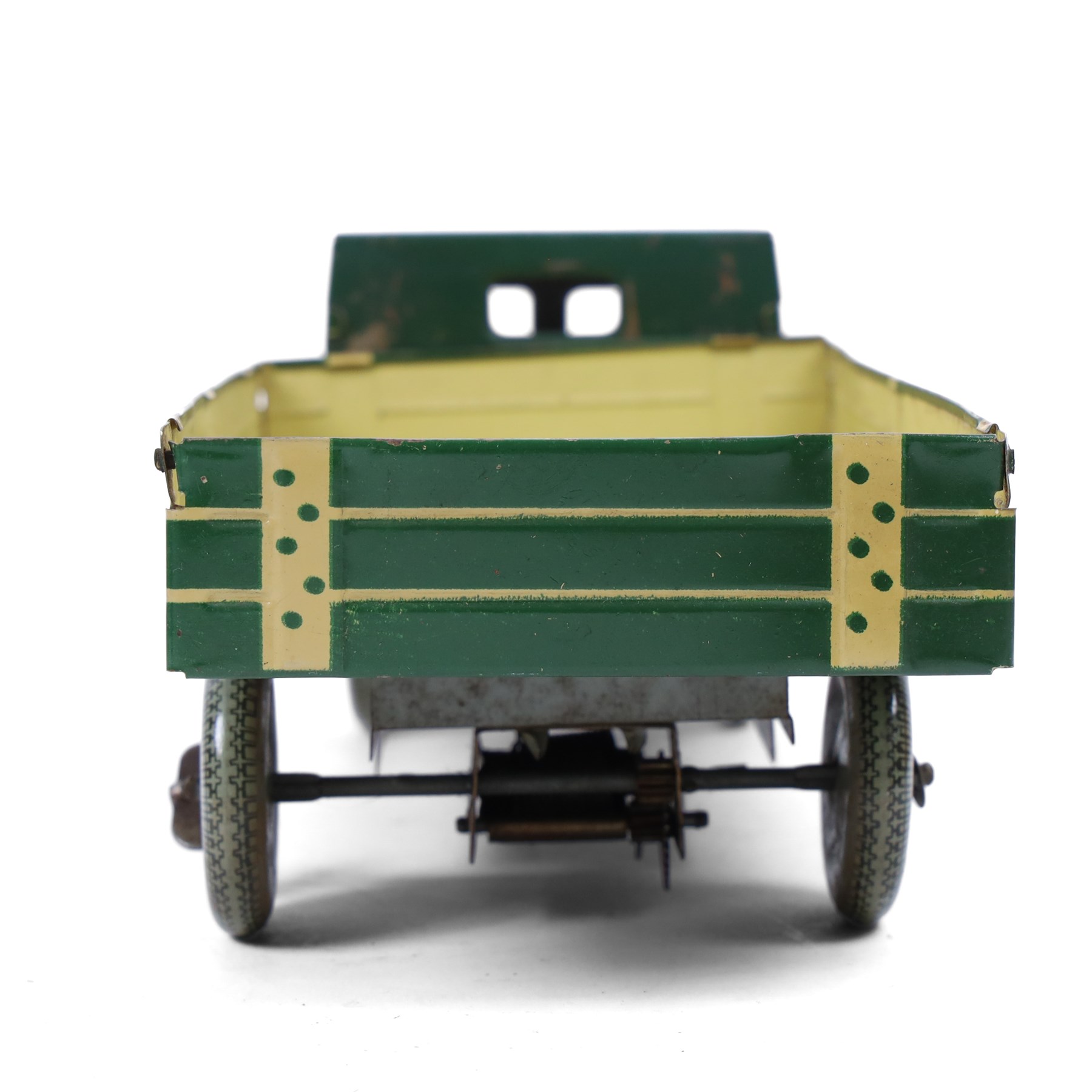 Mettoy tin plate clockwork Dunlop 90 tipper truck, in green and cream livery, H10cm, L28cm