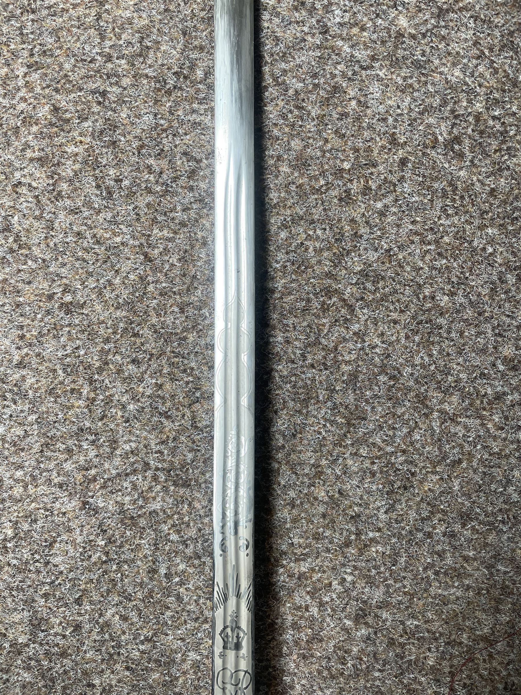 George V basket hilted broad sword with engraved blade, wire wound fish skin grip and field service scabbard, blade length 83cm