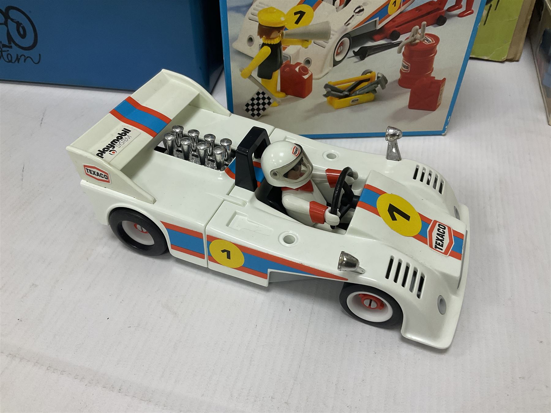 Fischer Technik/Lego/Playmobil - thirteen model building sets comprising eight Fischer Technik sets 50, 50/1, 50v, 50/2, 50+mot1 and two 50S, 50/1 add-on pack, with spare parts packs 01, 03, 05, two 22 and 30; two Lego sets comprising C107 and Lego Systems 103, part-set 870 and 970; Playmobil no.3520 set; four boxes of loose lego, various instruction manuals and a scrapbook 