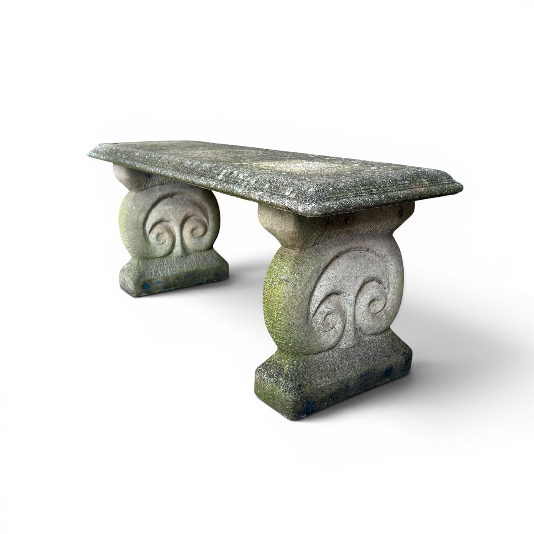 Three piece weathered cast stone garden bench, rectangular top on rounded detailed base