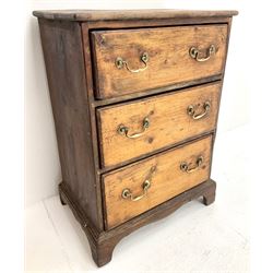 Early 20th century pine chest, three drawers, shaped plinth base
