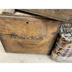 Two wicker baskets, three pine lidded bottle crates with quantity of glass bottles, comprising one with R.L. June & Co Ltd Mansfield black lettering and pair detailed Mandora Soft Drinks, Mappin & Webb blue cardboard box and framed With the Colours Punch 1924 print, larger basket W60cm