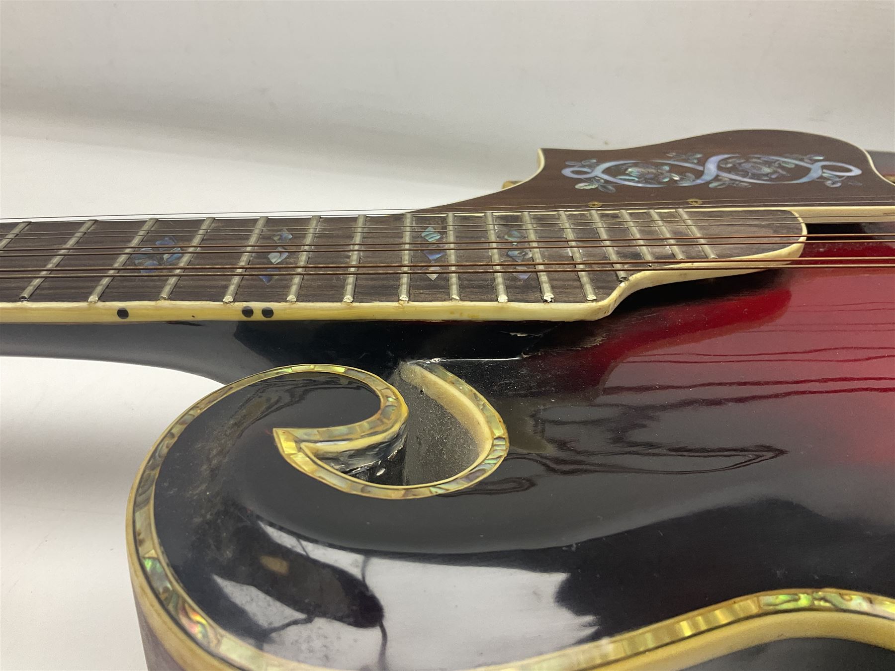 Eastern eight-string mandolin with red sunburst finish and mother-of-pearl inlay of eagles, clouds, trees etc L86cm; in fitted hard carrying case