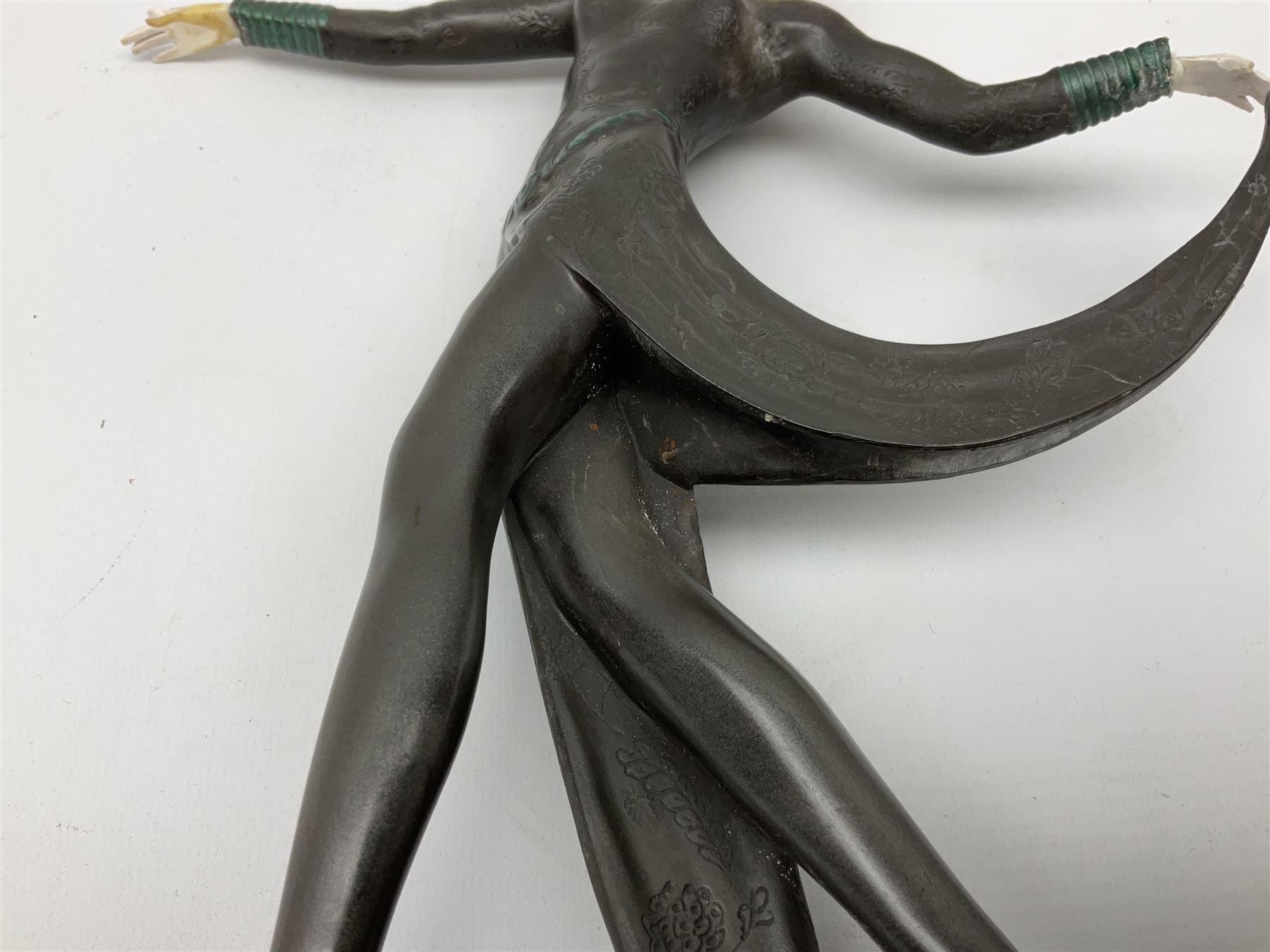 Art Deco style bronze, after Josef Lorenzl, modelled as a dancing lady with outstretched arms, with resin head and hands, raised upon marble effect base, signed to base, H38cm