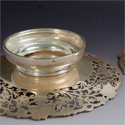Pair of 1930s silver pedestal dishes, of circular form, the sides with pierced vine decoration, upon a domed pedestal foot, hallmarked Lee & Wigfull, Sheffield 1938, D21cm, H6cm