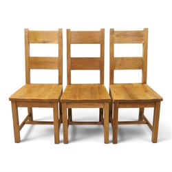 Indigo Furniture - large rustic oak dining table, rectangular four plank top raised on square supports; with set of six beech high ladder-back dining chairs