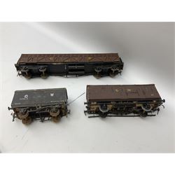 '0' gauge - fifteen early 20th century scratch-built wooden and metal goods wagons including open and flat-bed wagons, cable drum wagon etc; together with four wagon chassis and quantity of spare parts and wheels