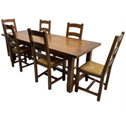 Antix French oak dining table with two leaves, two frieze drawers;, and six ladder back chairs with rush seats