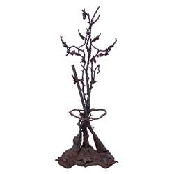  Victorian style cast iron hunting/shooting hall stand, branch and leaf design with shot gun by  trunk, dead hare, other game and powder case on naturalist base, in the manner of Coalbrookdale, H190cm  