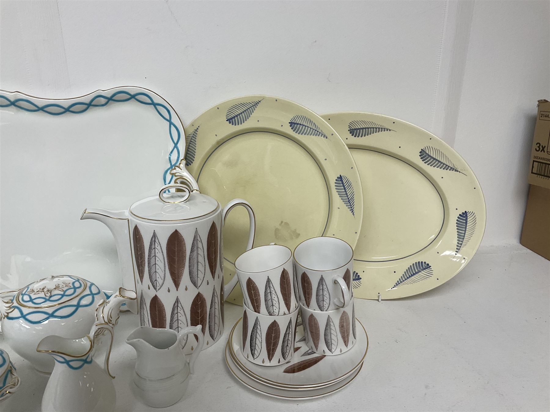 Victorian cabaret set,  comprising teapot, milk jug, covered sucrier, open sucrier, two cups and saucers upon a tray, together with Susie Cooper Hyde Park pattern coffee set, comprising coffee pot, four coffee cans and saucers, dessert plates and three plates in a similar design 