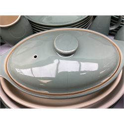 Denby Manor Green pattern part tea and dinner service, to include seven dinner plates, thirteen side plates, ten dessert plates, two oval dishes of various sizes, four cups and saucers, seven bowls with covers, two teapots etc (74)  
