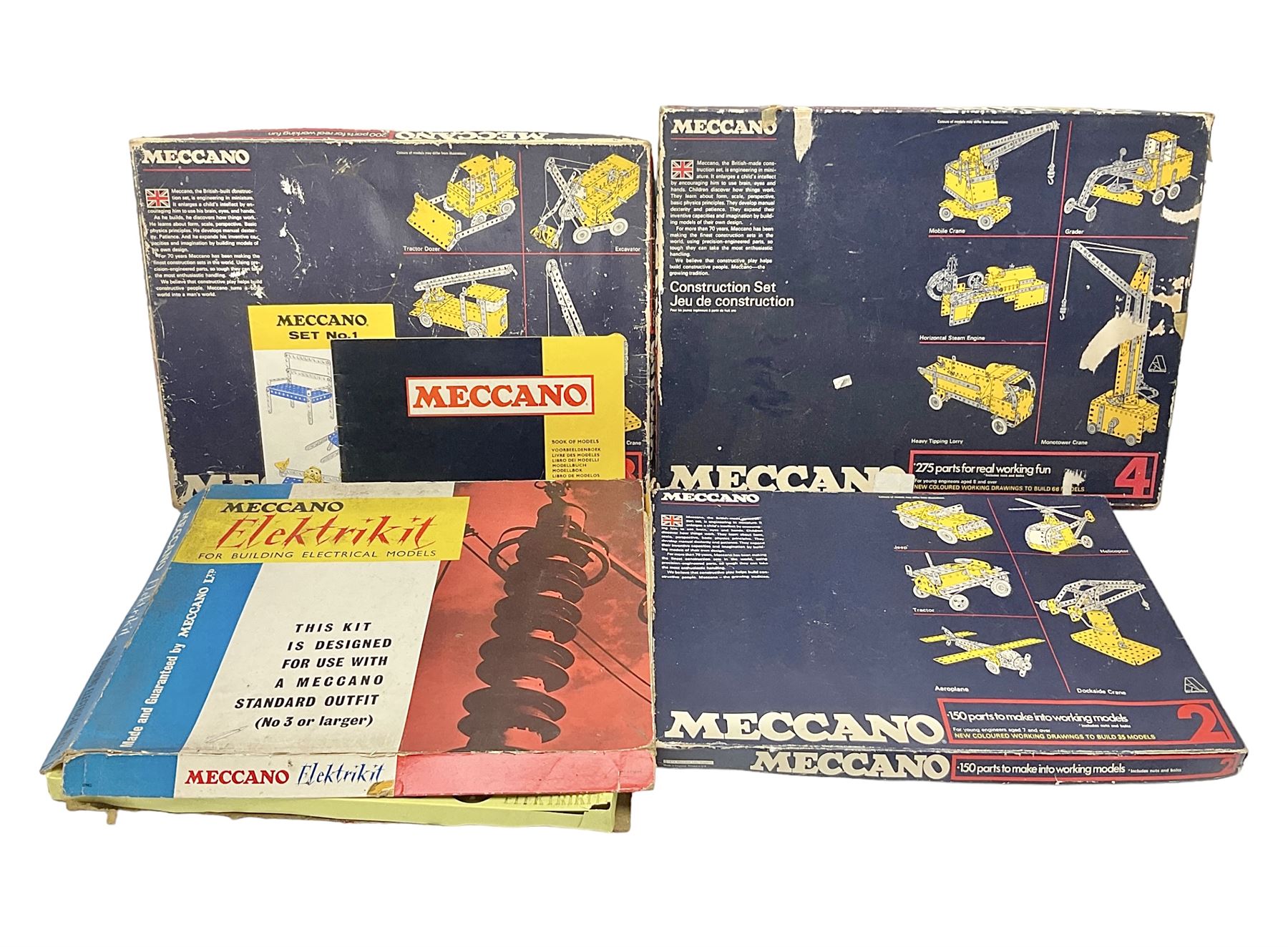Meccano - Outfits 2, 3 & 4 with blue and yellow parts; look to be virtually complete with most apertures filled; together with a partially stocked Meccano Elekrikit; all boxed with instruction manuals (4)