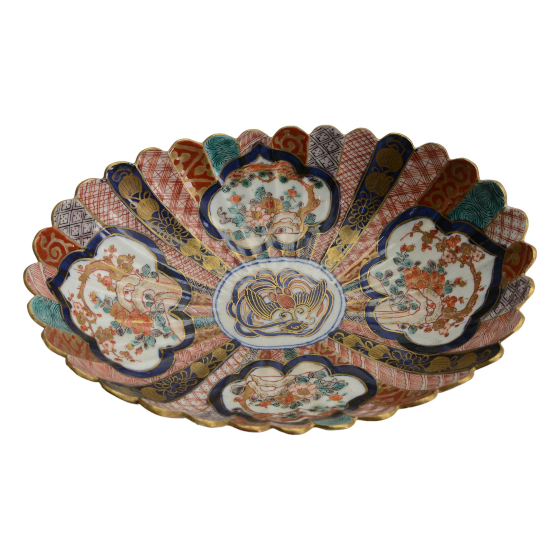 Japanese Imari dish, with scalloped edge, the internal decoration with panels of blossoming branches and a central bird, together with another imari bowl and three vases, scalloped dish H7cm