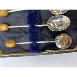 Two silver napkin rings by Collingwood & Sons Ltd, Birmingham 1928 and two other silver napkin rings hallmarked, approx 3.2oz, cased set of silver silver handled knives, hallmarked Sheffield 1915, together with a selection of silver plated flatware, to include Walker and Hall fish eaters set, cased nut cracker set with grape scissors, etc., plus a silver mounted hair brush and hand held mirror, hallmarked Chester 1919