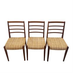 Mid-20th century teak oval extending dining table with set of six teak ladder back chairs with upholstered seats, table W150xD91xH74cm, 199cm extended, chairs W41xD43xH94cm