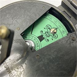 19th century Watkins combined clinometer and compass, patent 217, by J. Hicks Maker 8 Hatton Garden London No.5829, of drum shaped form in lacquered brass case D7cm; both instrument and case bear the name of former owner Thomas S.N. Hardinge; with early 20th century postcard caricature of a serviceman (2)