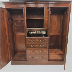  Edwardian inlaid mahogany break-front wardrobe, two doors above four graduating drawers flanked by two full length mirrored doors enclosing hanging rail and hooks, plinth base, W207cm, H216cm, D66cm  