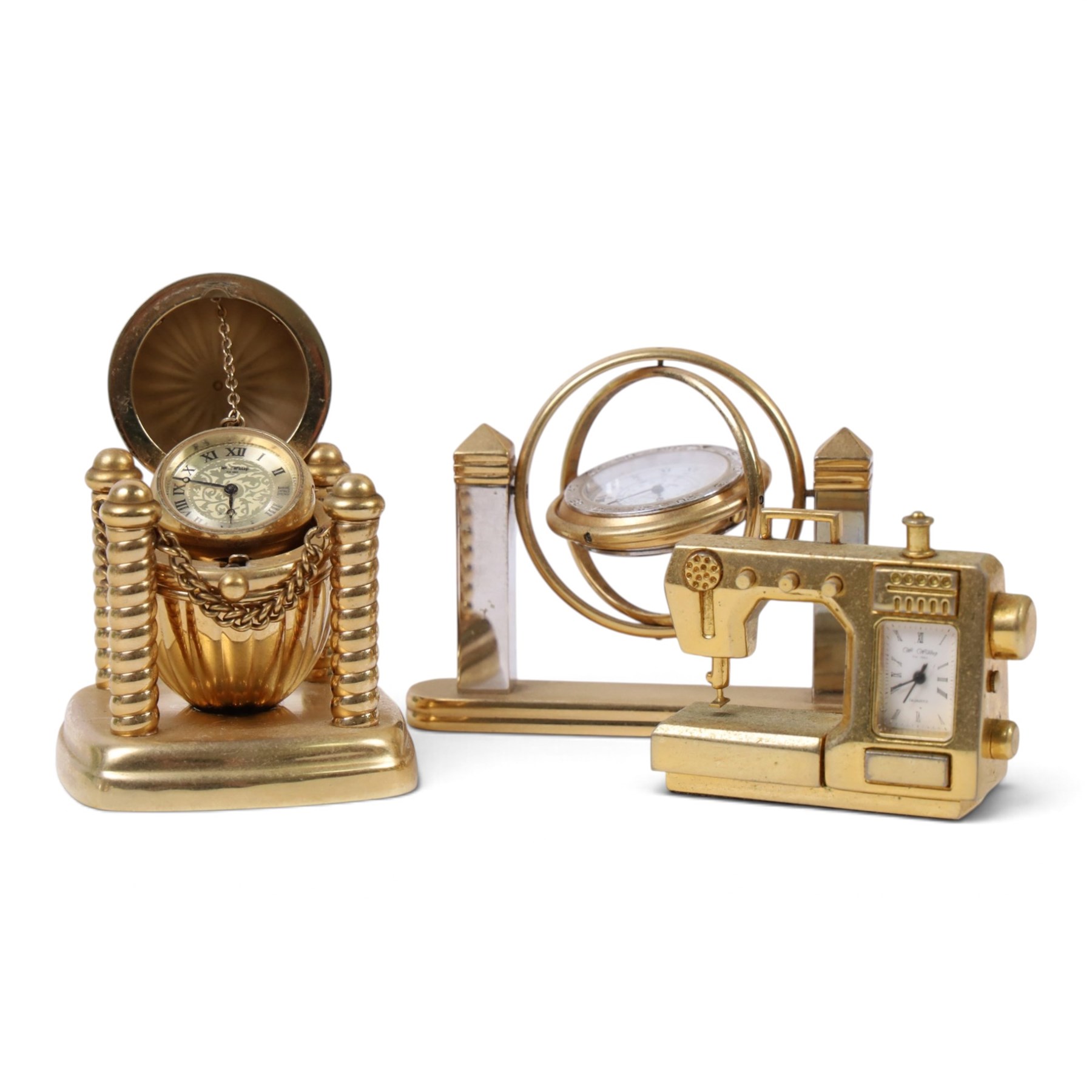 Large collection of miniature novelty clocks, including examples modelled as ships, a lamp, handbag, sewing machine, lamp etc 
