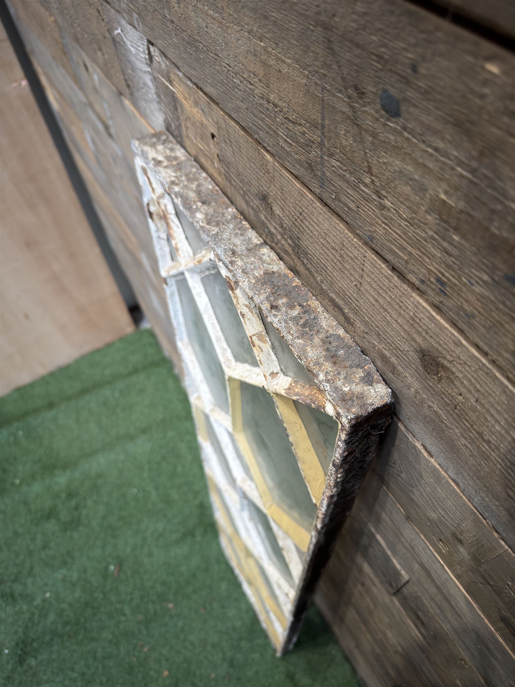 Four 19th century cast iron windows, lattice glazed in white painted finish, 