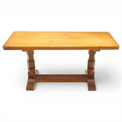 Mouseman - adzed oak rectangular refectory style coffee table, with rectangular adzed top, raised on octagonal supports united by a stretcher, with carved mouse signature, by the workshop of Robert Thompson of Kilburn