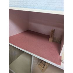 Two storey modern dolls house, with a collection of dolls house furniture and accessories, dolls house H66cm
