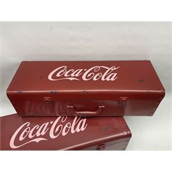 Two reproduction Coca Cola trunks, largest H20cm, L66cm