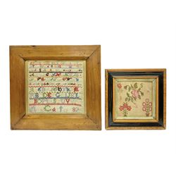 Victorian sampler, worked by Ann Carter, dated 1879, decorated with bands of letters and numbers, together with a small needlework of flowers, both in wooden frames, tallest H48cm
