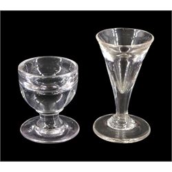 19th century toastmasters glass, the trumpet bowl upon firing type foot, H10cm, together with a further 19th century toastmasters/ penny lick type glass with deceptive rounded bowl upon firing type foot, H7cm