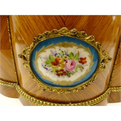  Late 19th/ early 20th century French kingwood two handled jardiniere of quatrefoil form with foliate gilt metal mounts, porcelain panel painted with floral sprays in the Sevres style below a pierced gallery, with removable tin liner, L36cm x H18cm x D25cm. Provenance Property of Bob Heath, Brandesburton Formerly of Ravenfield Hall Farm near Rotherham  