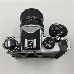 Nikon FE2 camera body, serial no. 2043167, with 'Nikon Zoom-NIKKOR 35-70mm 1:3.3-4.5' lens, serial no 3006624 and Nikon MD-12 Motor Drive, serial no. 1679037