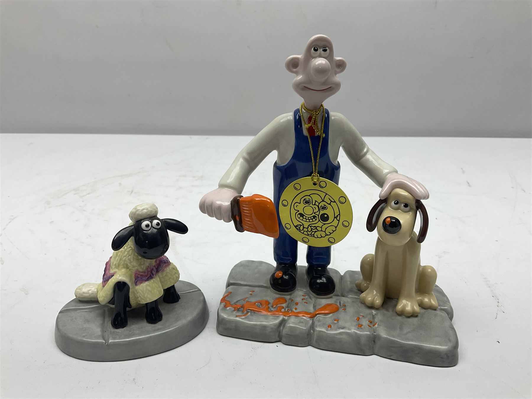Six Coalport Characters Wallace and Gromit figures, comprising Ready for Takeoff, Woolshop Encounter, Do Something Gromit, Shaun's New Coat, More Cheese Gromit and Happy Birthday Gromit, two with original boxes 