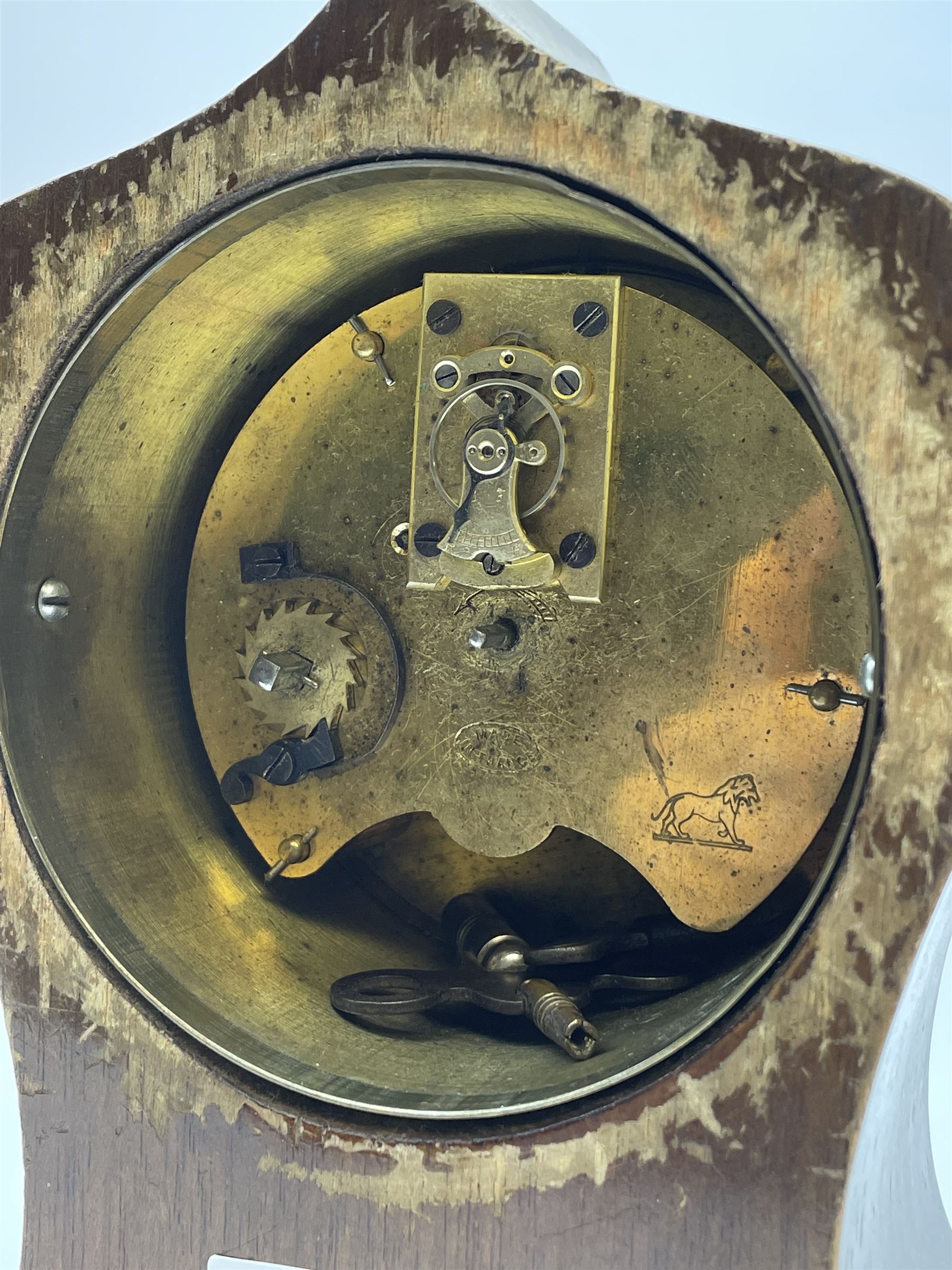 Edwardian inlaid mahogany mantel clock, pointed onion top and circular white enamel Roman dial signed 'Elkington', on brass feet 