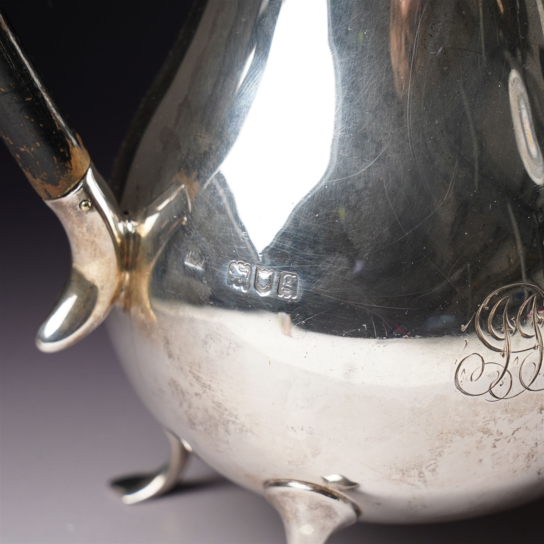 Silver matched five piece tea and coffee set of baluster form engraved with a monogram on shaped supports Sheffield 1913, the teapot 1911, the coffee pot 1924 Maker Mappin & Webb