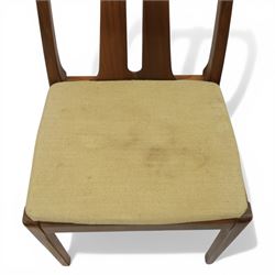 Nathan - teak drop leaf dining table and four Nathan dining chairs, the rectangular top with rounded corners fitted with twin hinged drop leaves and gate legs, extended to form an oval table 174cm in length, raised on square section supports united by stretchers, the chairs with teak frames and padded beige upholstered seat (H 96cm, W 48cm)