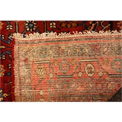  Hamadan red ground runner, geometric filled muticoloured field within triple striped repeating border, 510cm x 108cm  