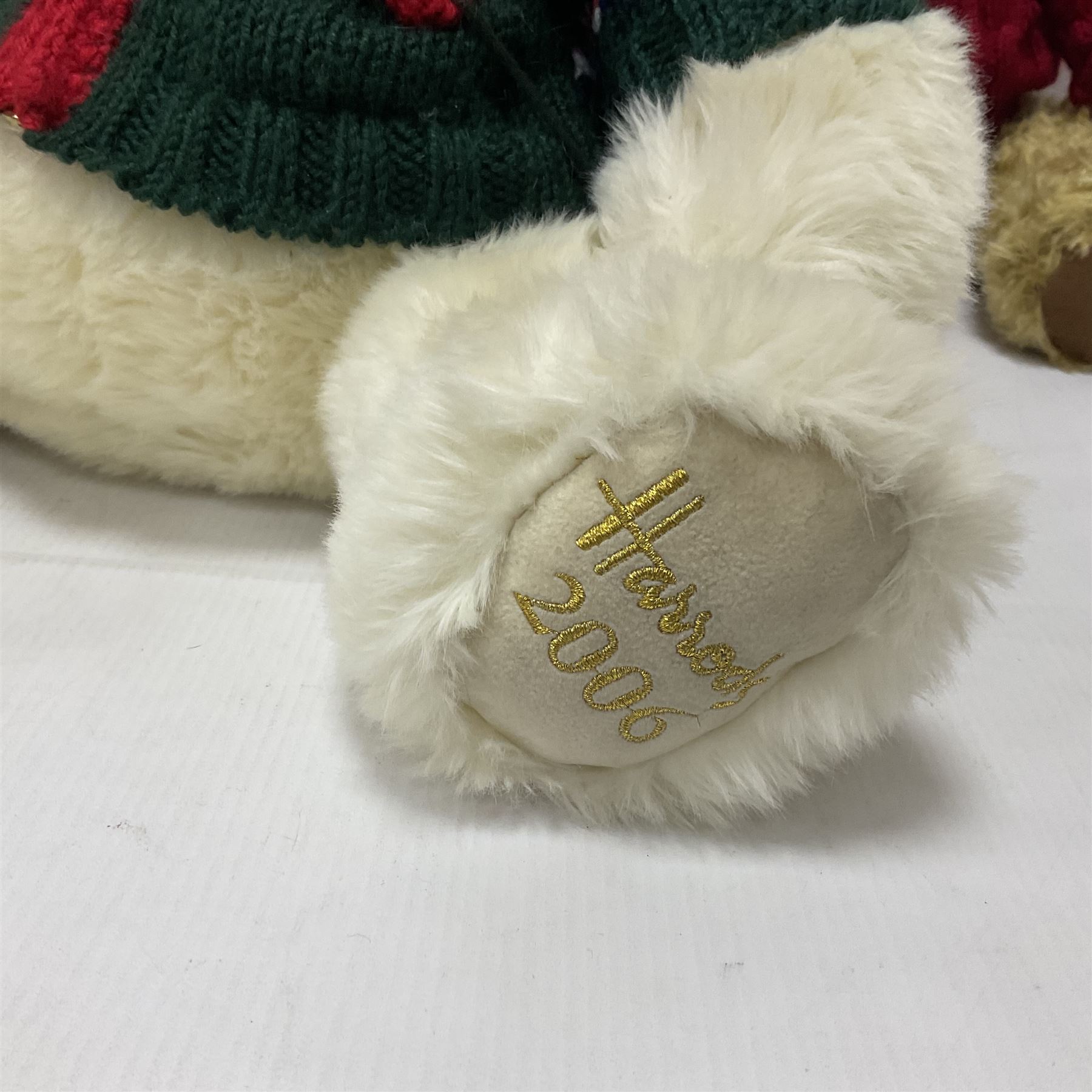 Six Harrods annual teddy bears, dating between 2005 and 2010, including 20th anniversary edition bear, tallest H39cm
